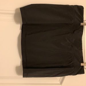 Black skort, athletic material with built in shorts, new, large